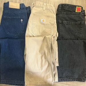 34 by 34 3 pairs men’s relaxed Jeans 1 Carharrt, 2 EmpireTan, black and denim